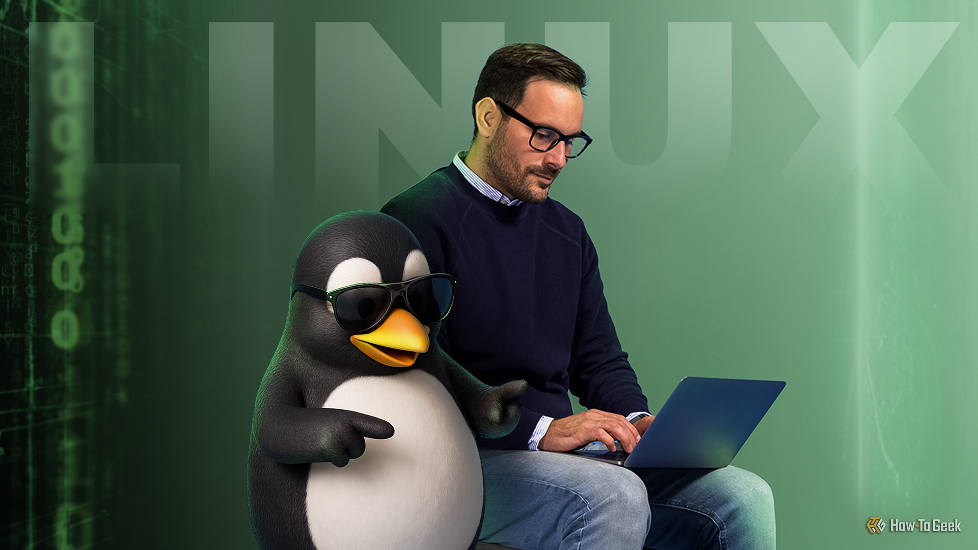 A man using a laptop next to Tux, the Linux mascot wearing sunglasses.