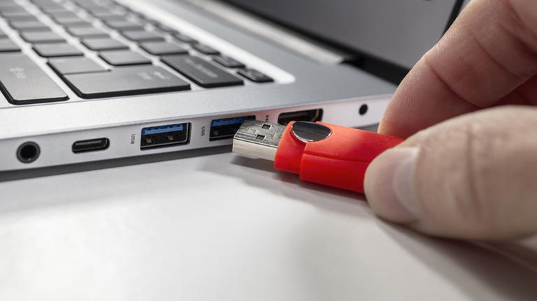 USB drive being plugged into port
