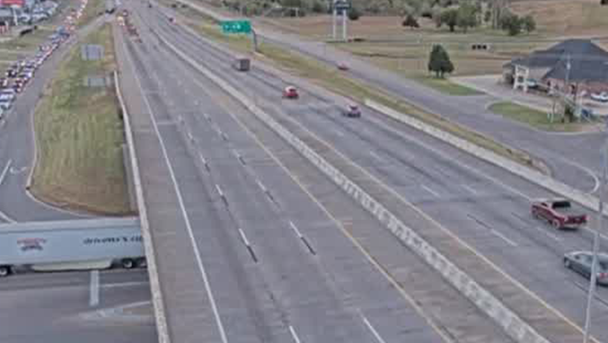 Person arrested after crash involving semi-trailer shuts down ...