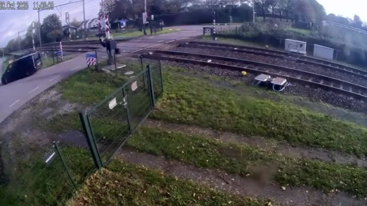 Train crashes into lorry stuck on level crossing sending PEARS flying ...