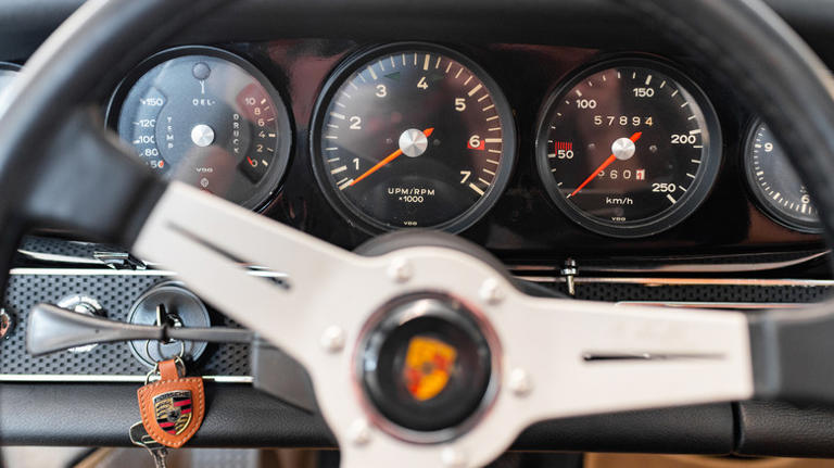 Why do Porsches have the ignition on the left?