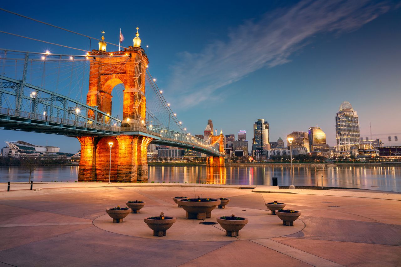 John A Roebling Suspension Bridge downtown Cincinnati skyline in the background