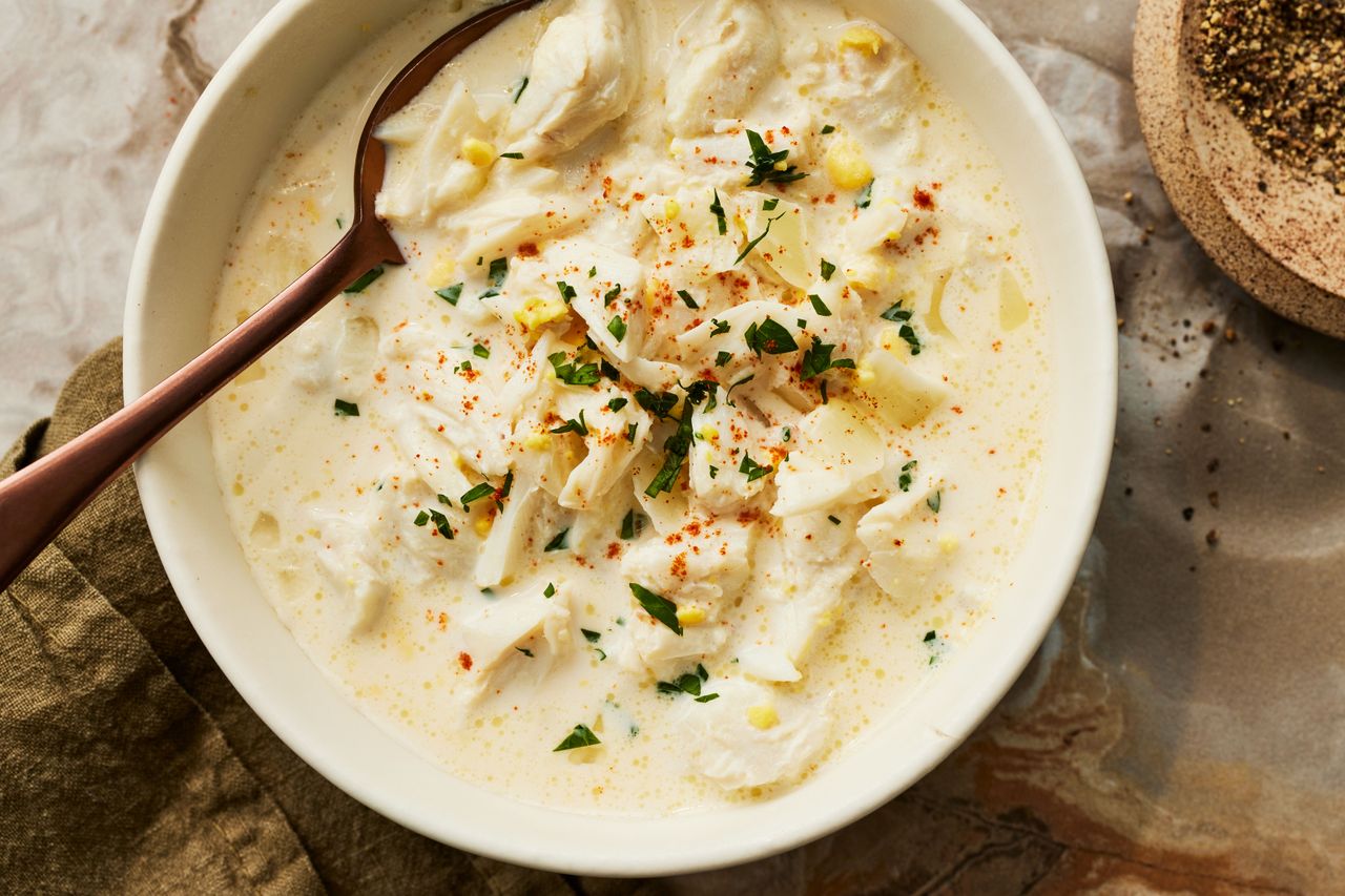 Southern Living She-Crab Soup in a white bowl with spoon