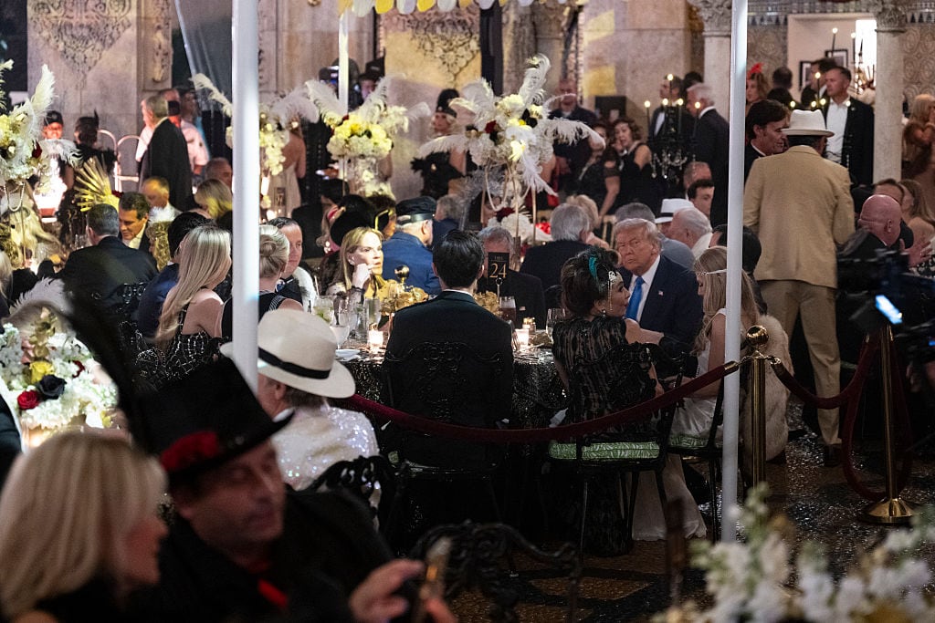 Trump sparked further controversy for partying the night before SNAP funding expired. / ROBERTO SCHMIDT / AFP via Getty Images