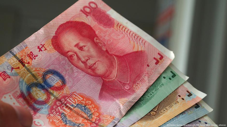 Yuan topples dollar in China's trade, but hits speed bumps