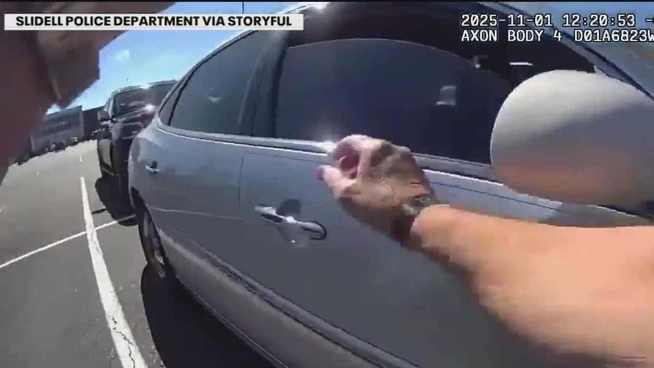 Woman drives police officer in car chase