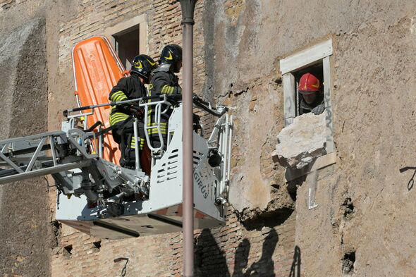 Horror moment Rome's medieval tower near Colosseum collapses during ...