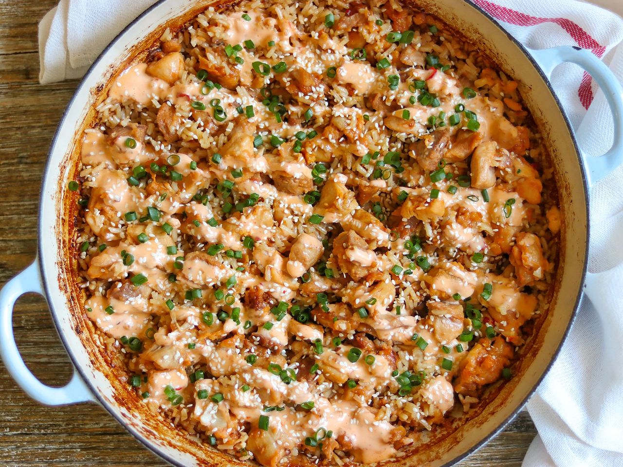 Bang Bang Chicken casserole topped with green onions and sesame seeds