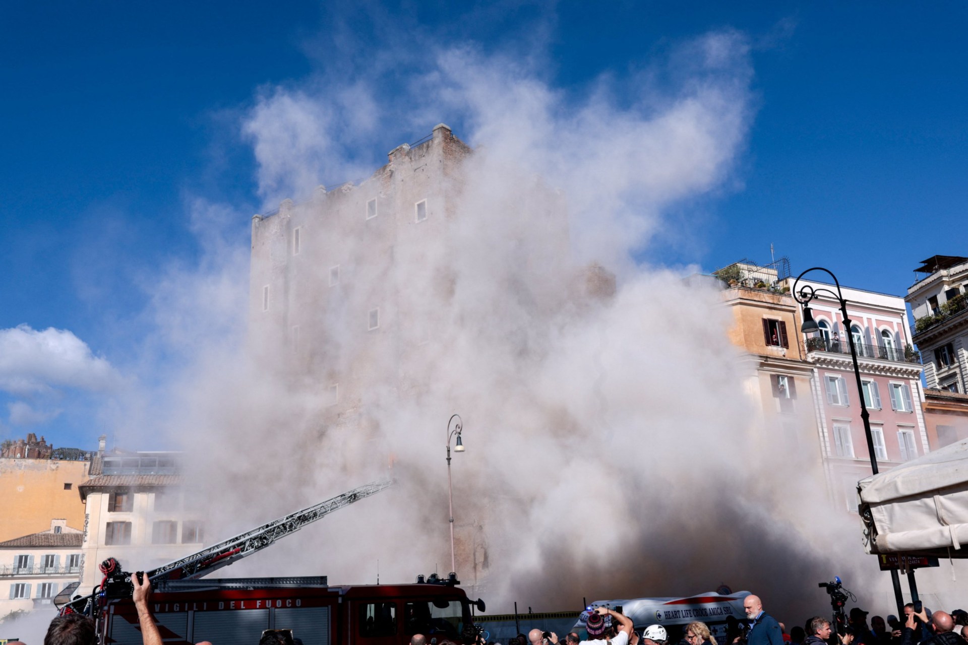 Trapped worker dies after medieval tower collapses