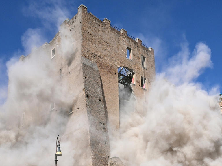 Worker trapped for 11 hours after collapse of medieval tower in central ...
