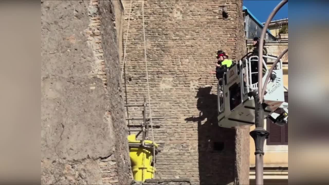 Firefighters rescue workers trapped when medieval tower collapses in Rome