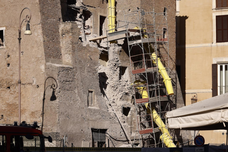 Worker trapped for 11 hours after collapse of medieval tower in central ...