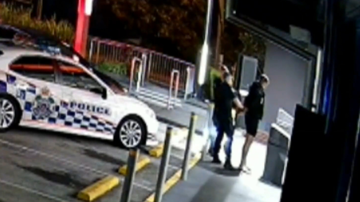 Woman charged with ramming police cars in Hungry Jack's car park