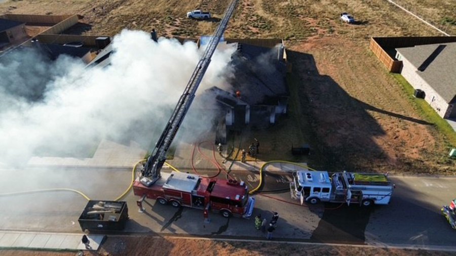 Smoke visible as crews respond to structure fire near Wolfforth