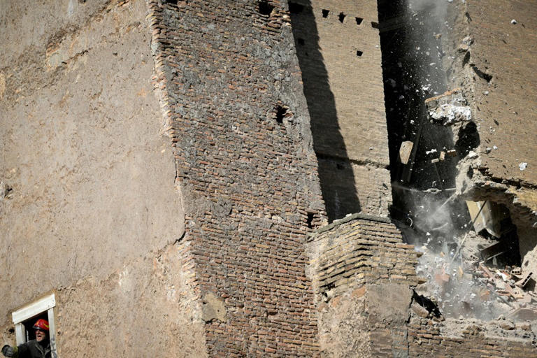 Worker dead after being pulled from rubble of collapsed Roman medieval ...