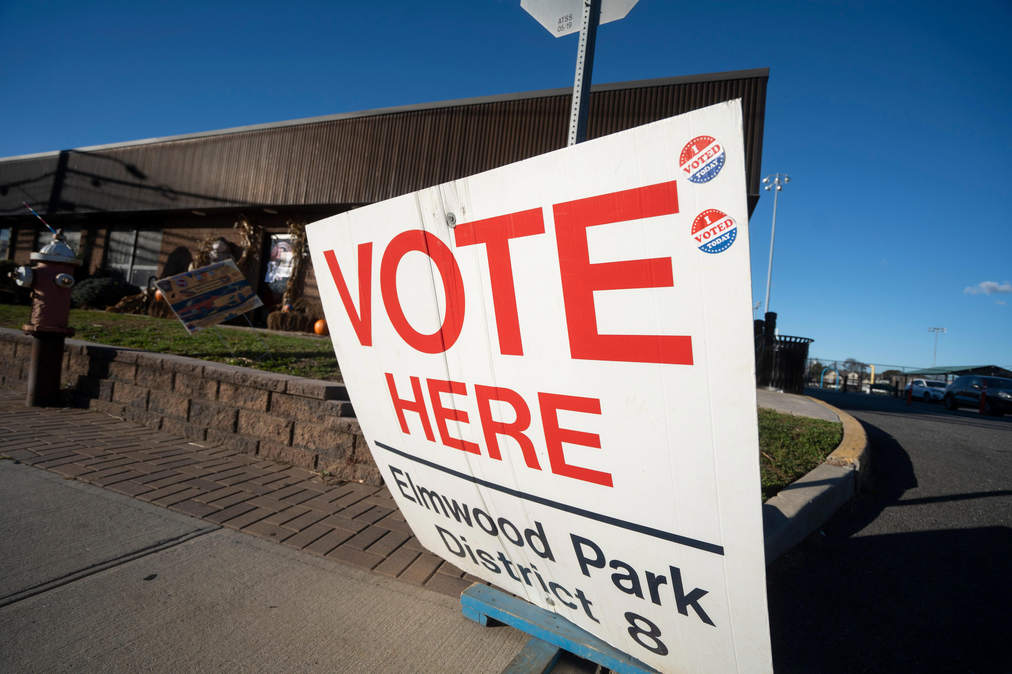 NJ considers placing new limits on police, military at polling places