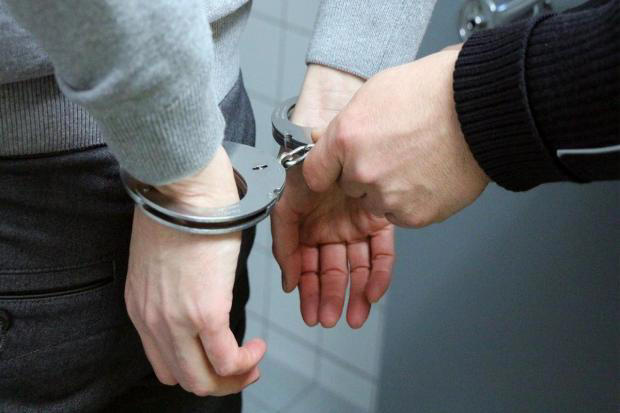 Arrest after man seen attacking van on city road at rush hour