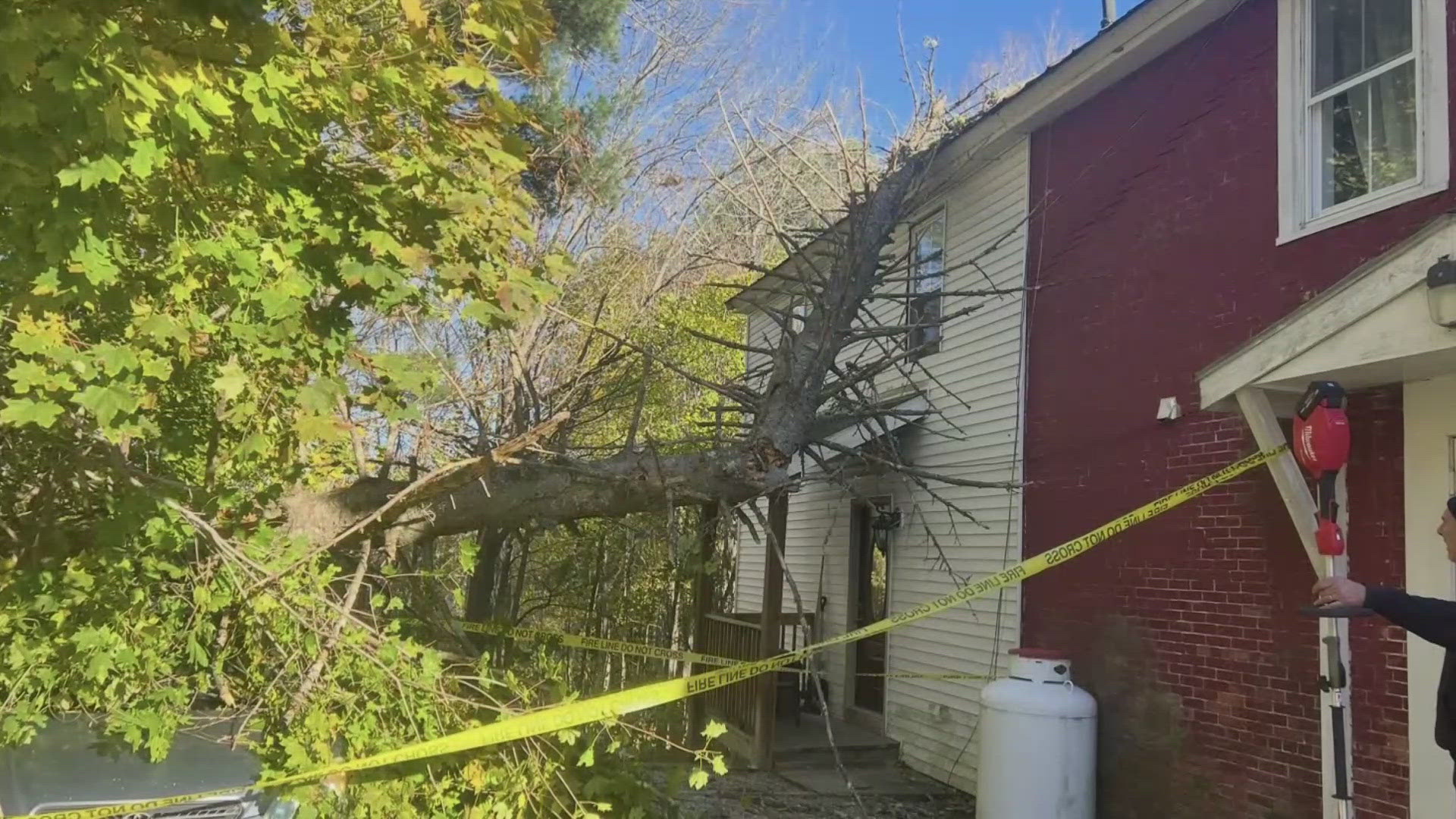 Powerful winds knock down trees and topple powerlines across Maine