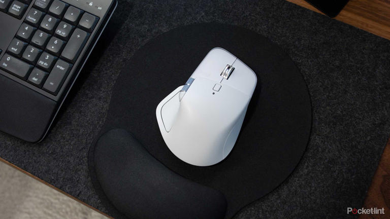 Logitech's MX Master 4 sitting on a mousepad