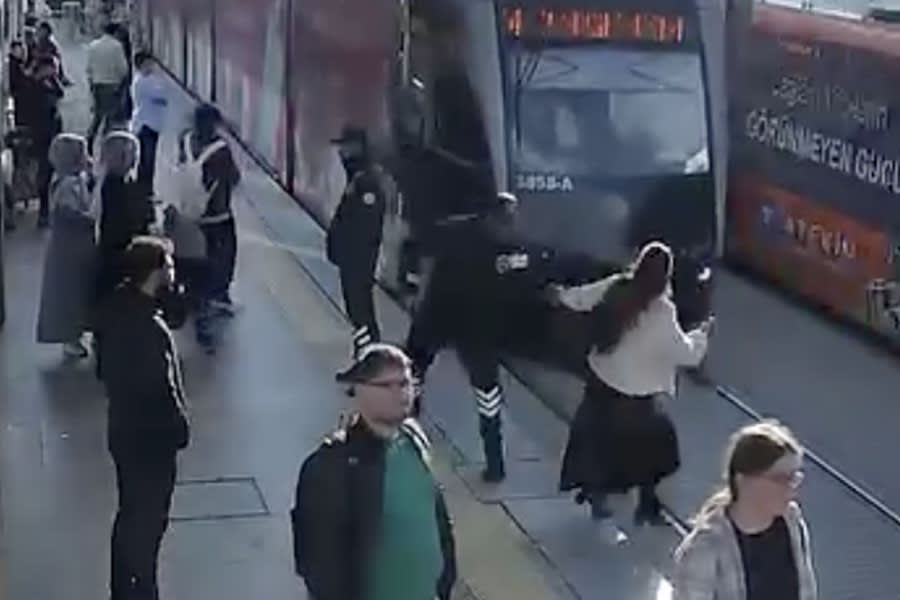 You have to see this! Dramatic footage shows security guard save woman ...