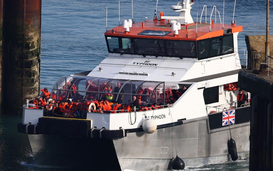 A Border Force vessel arrives at Dover marina carrying migrants - HENRY NICHOLLS/Getty