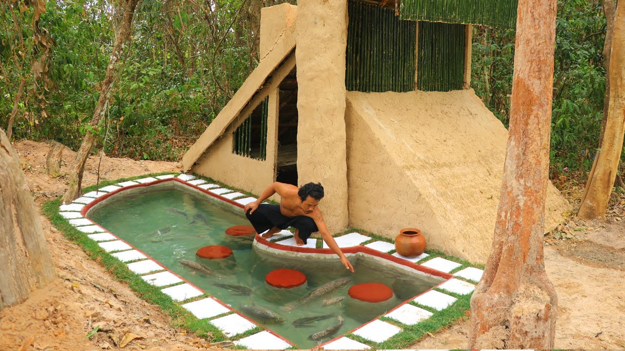 A mud house and fish pond built entirely by hand