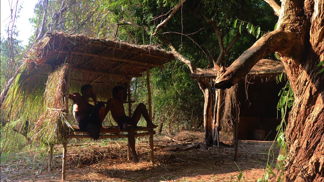 A $0 wooden bed shed made with primitive tools and natural materials