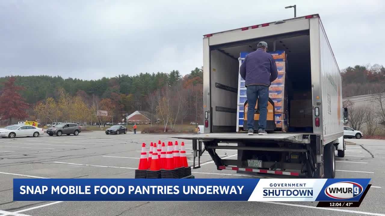 New Hampshire SNAP recipients line up Wednesday to receive food at ...