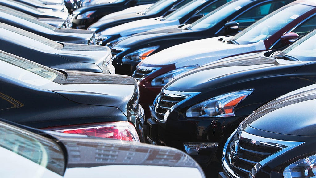 A trade war between the US and Canada could drive up the cost of buying a car. Here's what buyers need to know.
