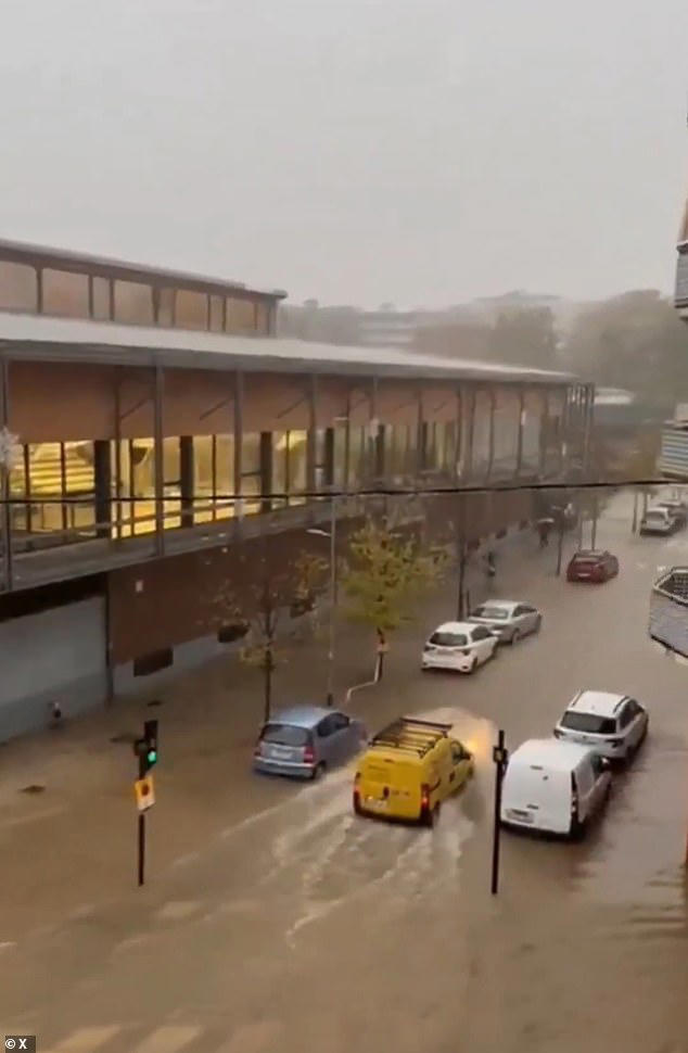 Mega storm lashes Spain as roads become rivers and flights are delayed ...