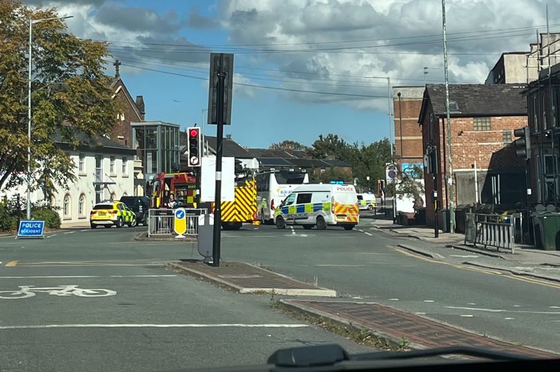 Man in his 20s dies after coach rolls back and hits him