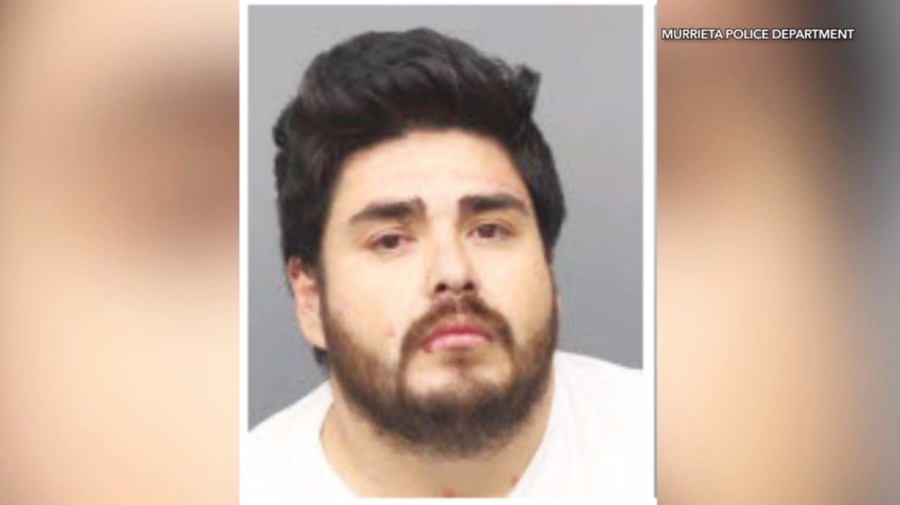 Suspect arrested after elderly man stabbed to death, woman hospitalized ...