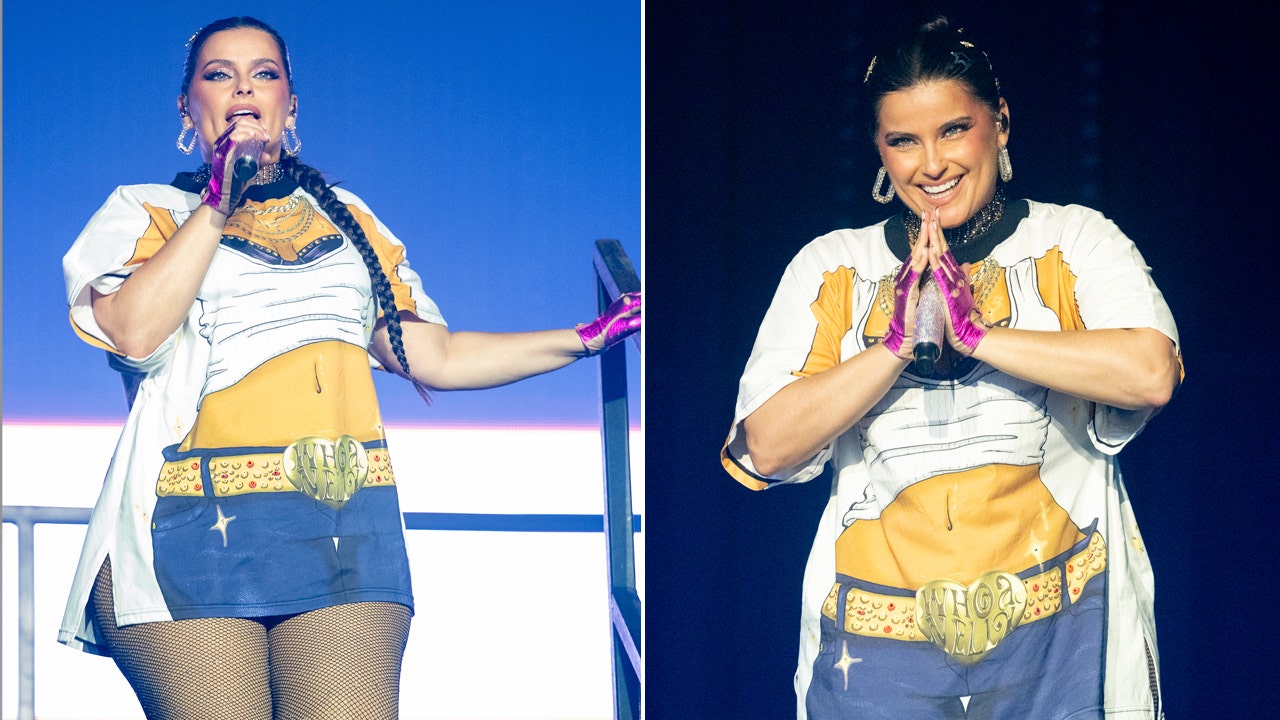 Nelly Furtado sings on stage in Manchester