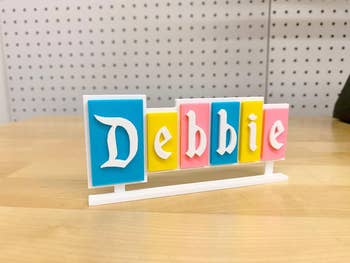 Table sign with colorful blocks spelling