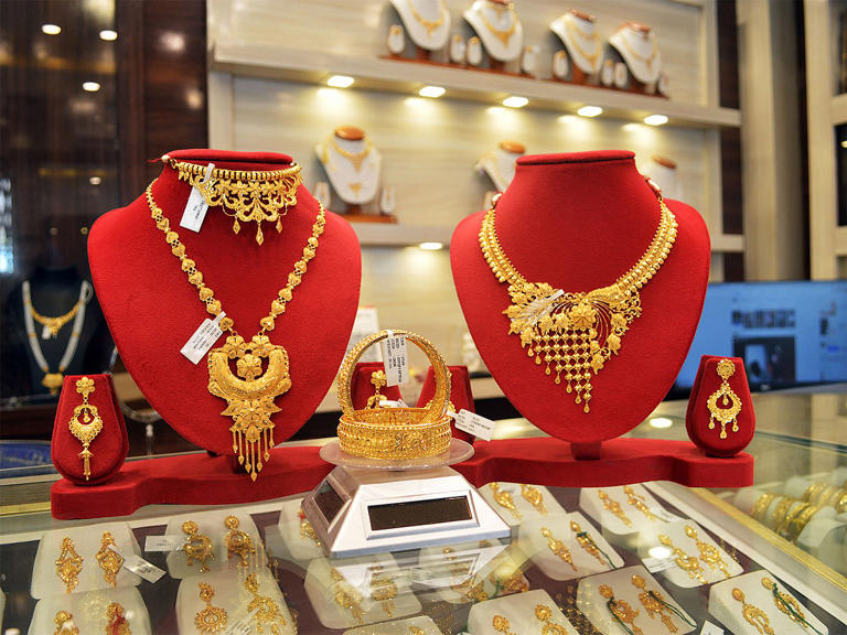 Gold, silver slide after record run as profit-taking sparks sharp ...