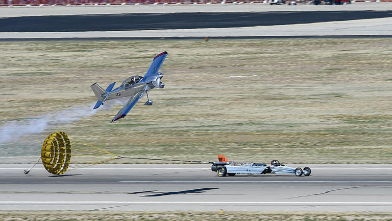 The role of parachutes in stopping drag cars