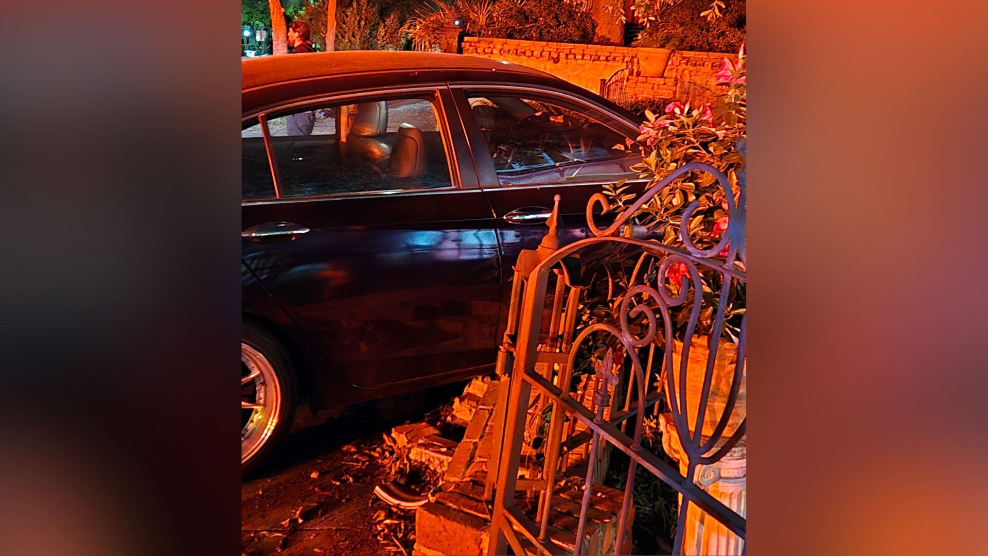Police investigating after car found crashed into brick wall near ...