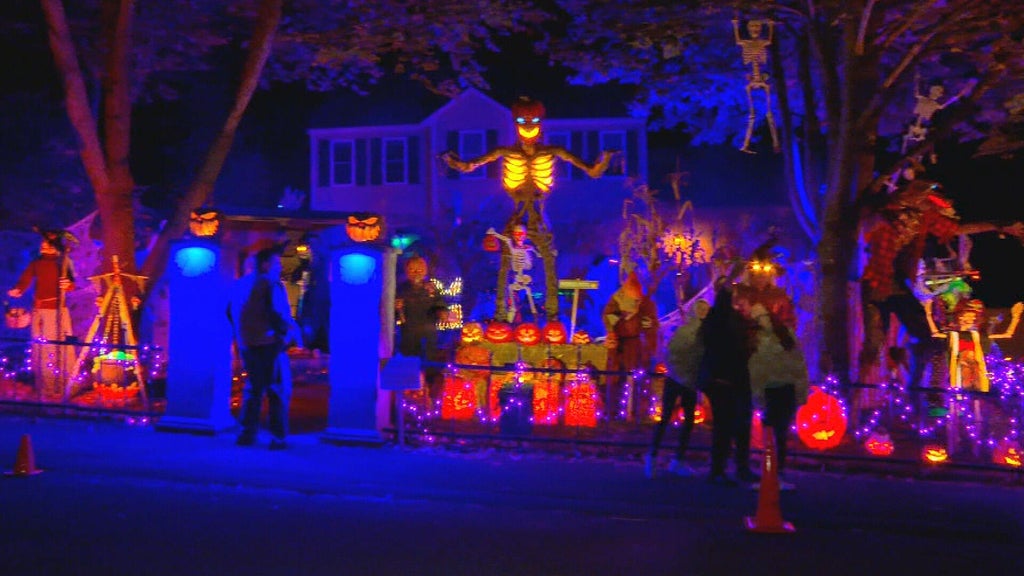Spectacular Halloween display at Massachusetts home also a food pantry fundraiser. 