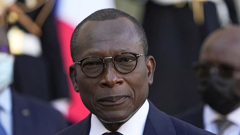 Benin President Patrice Talon listens to French President Emmanuel Macron after a signing ceremony at the Elysee Palace in Paris, Tuesday, Nov. 9, 2021
