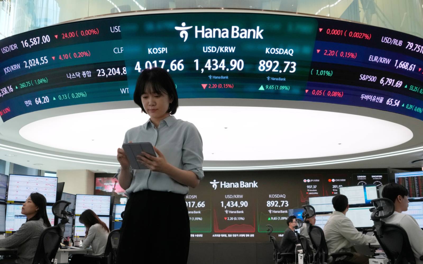 Asian stocks surge with Wall Street's tech boom