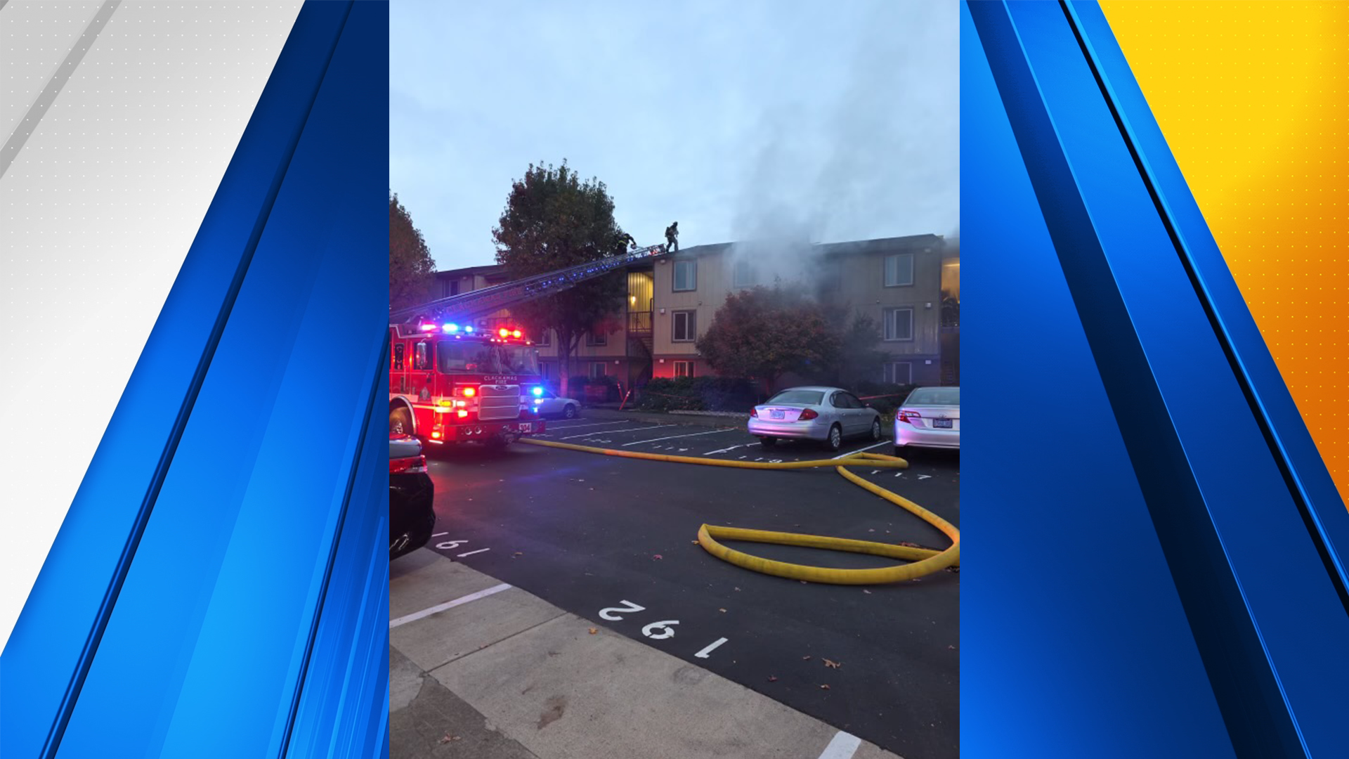 2 people hurt after apartment building catches fire in Happy Valley