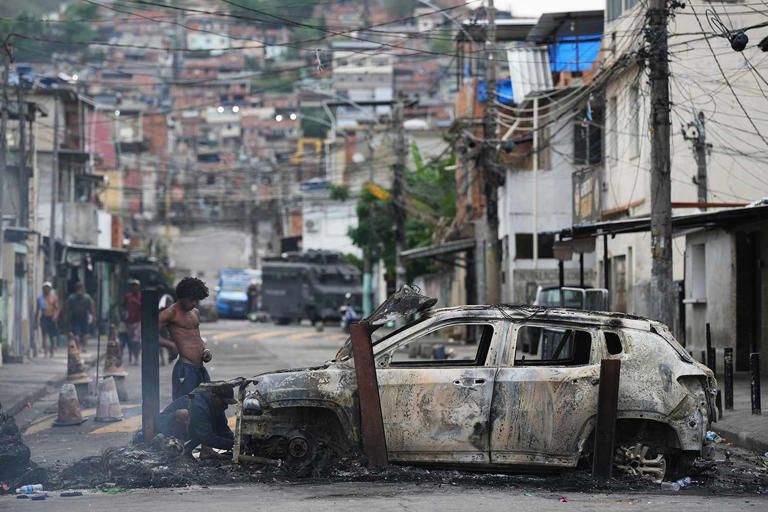 64 Dead, Including 4 Police Officers, After Largest Gang Raid in Rio de ...