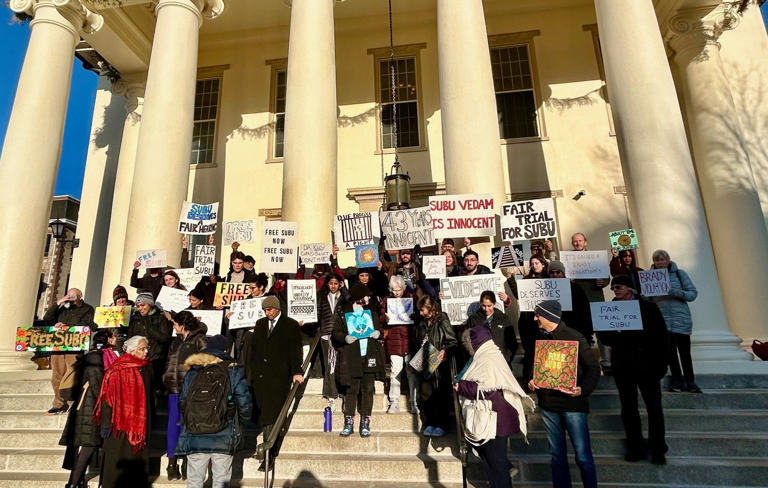 Supporters of Subramanyam “Subu” Vedam demonstrate outside the Centre County Courthouse in Bellefonte, Pa,, on Feb. 7, 2025, after a hearing over new evidence uncovered in his 1983 murder case. (Geoff Rushton/StateCollege.com via AP)