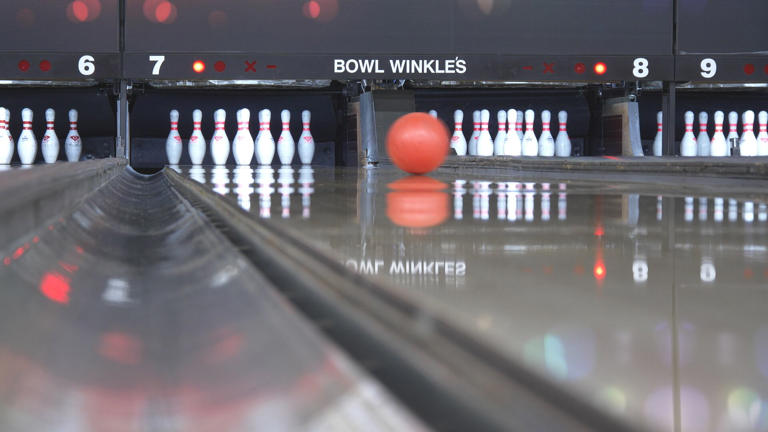Pin for Paws bowling event supporting local animal shelters