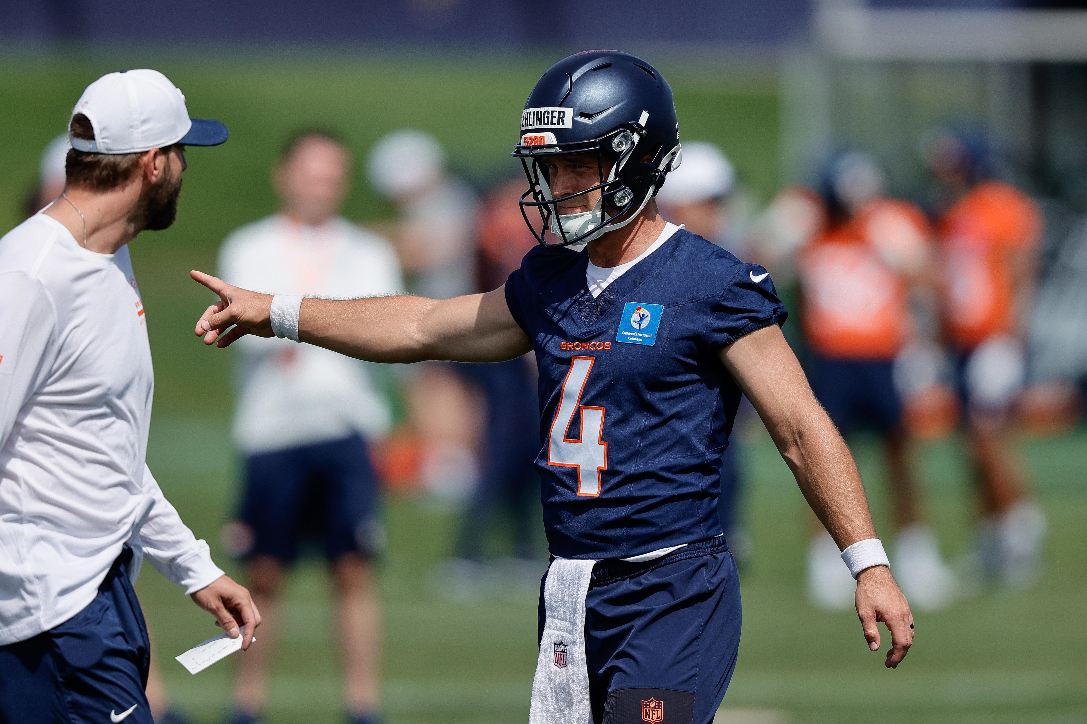 Broncos sign quarterback to practice squad ahead of Texans game
