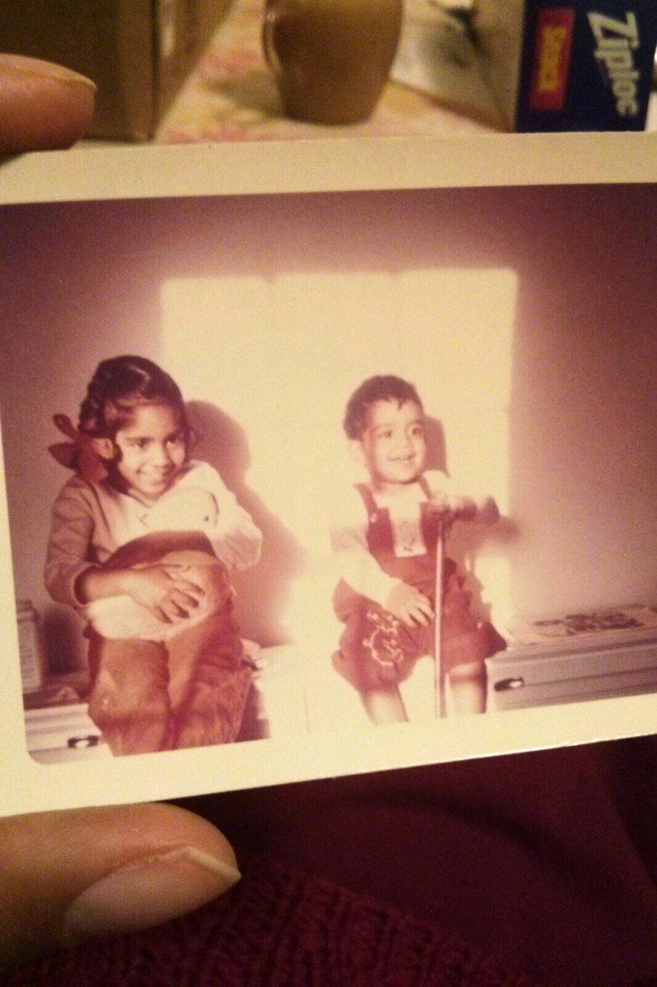 A photograph of Saraswathi, 6, and Subramanyam, 2, Vedam posing for a photo in their State College, Pa., home in 1963. (Saraswathi Vedam via AP)