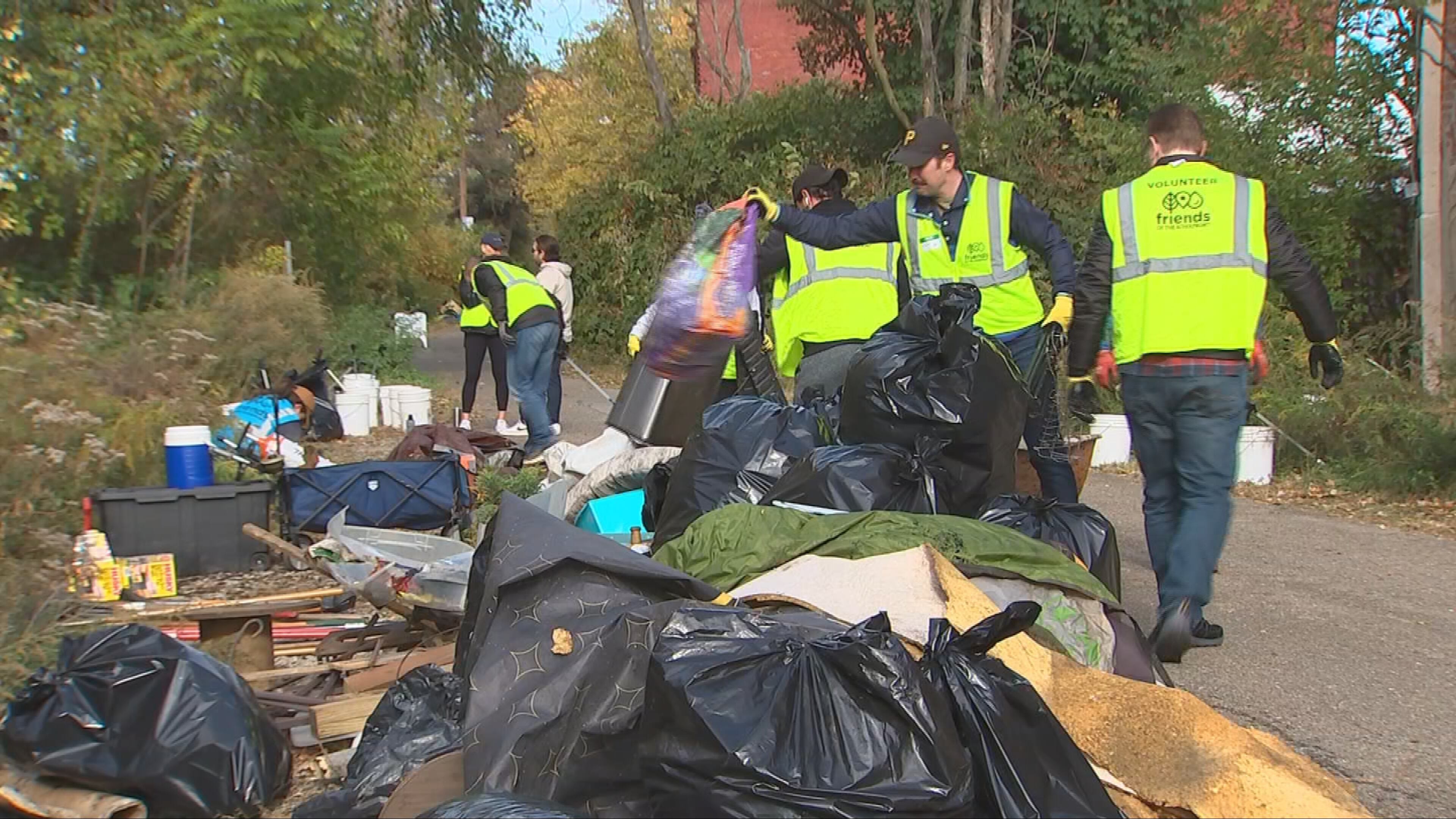 Volunteers clean up Three Rivers Heritage Trail in Pittsburgh as ...