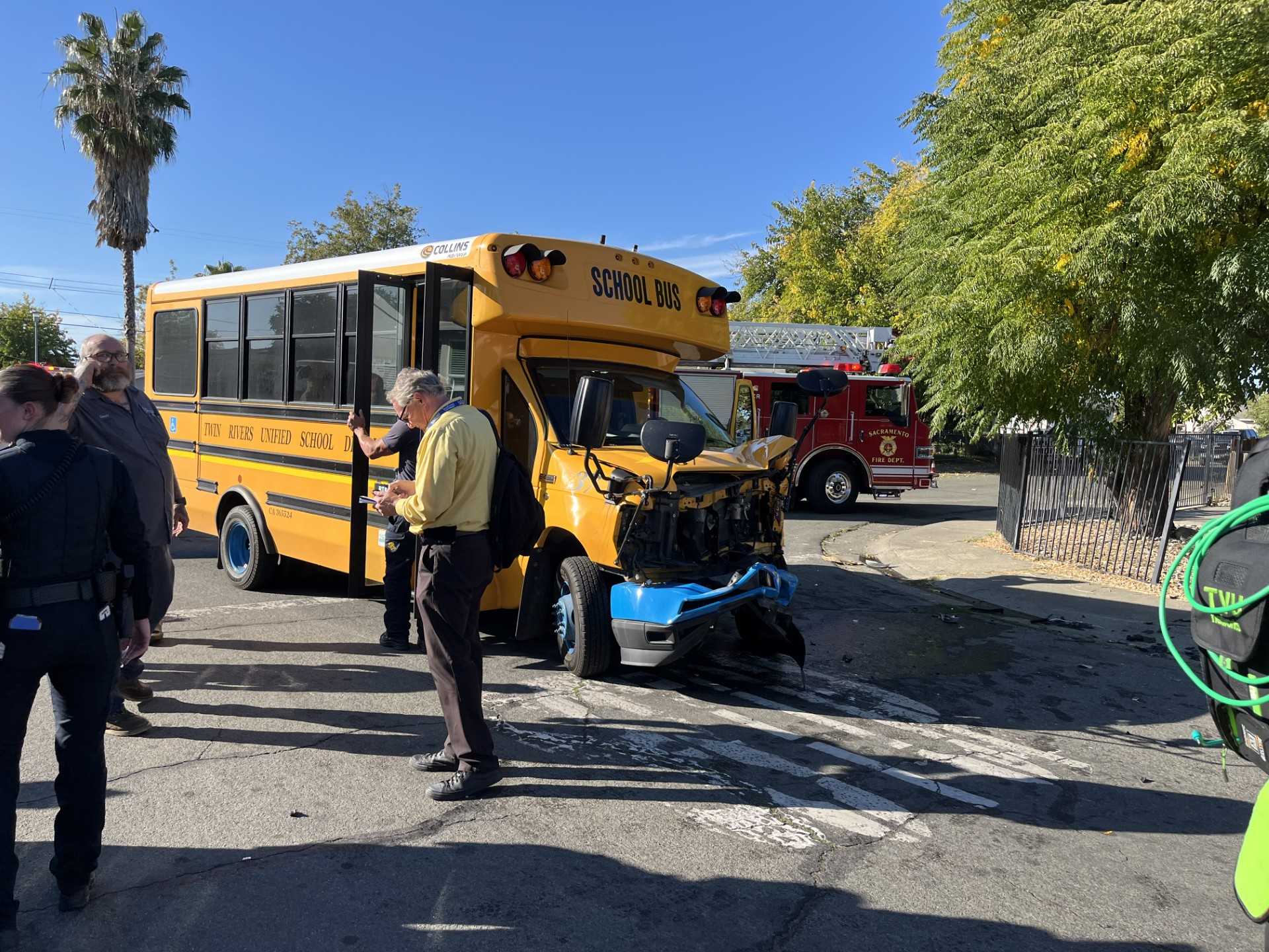 9 hurt after crash involving truck and Sacramento school bus, officials say