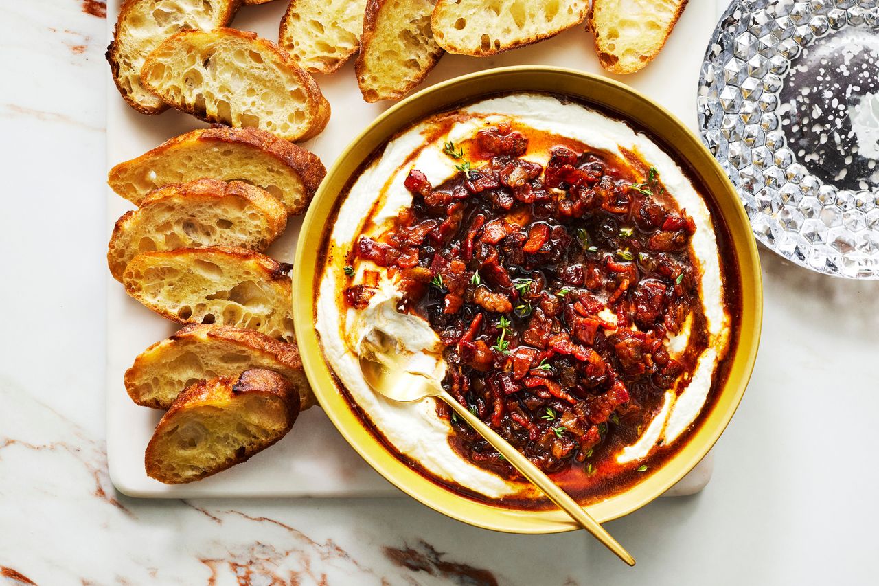 Southern Living Bacon Jam on top of whipped goat cheese with crostini to serve