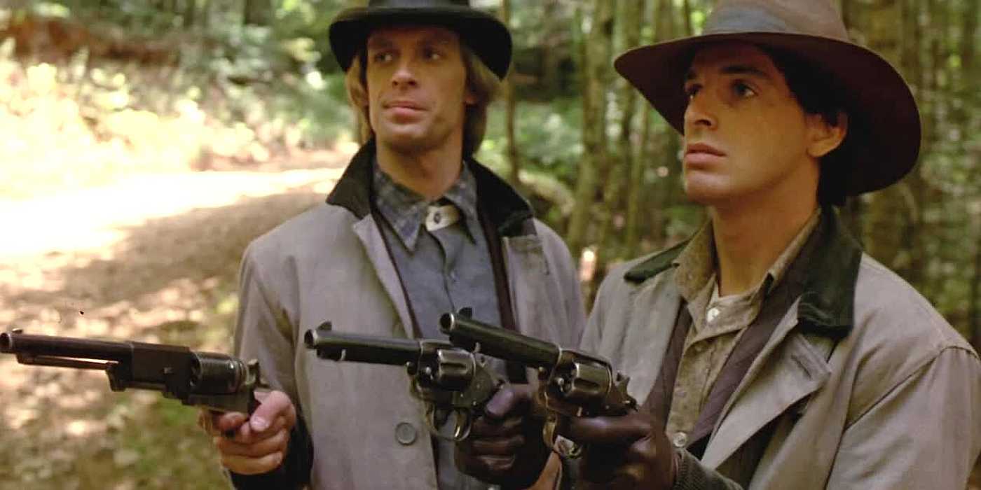Jim and Bob Younger hold someone at gunpoint in THE LONG RIDERS